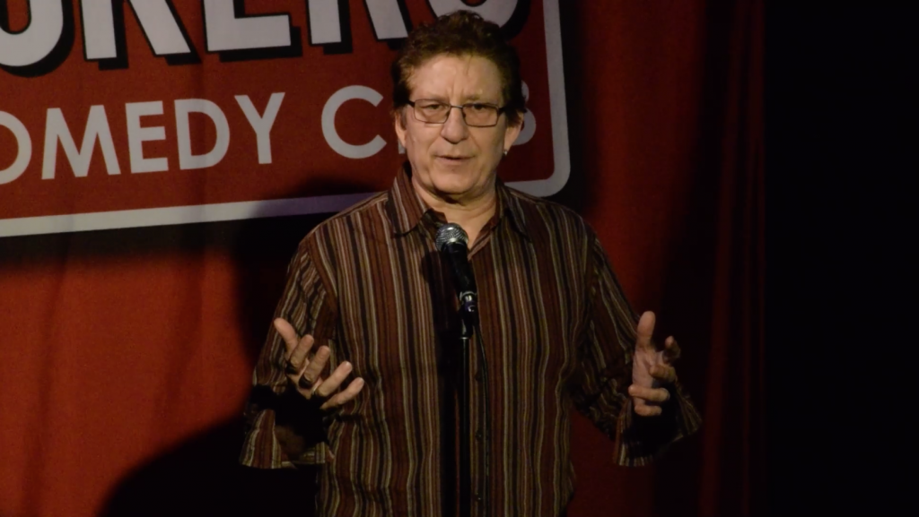 Richard Stubbs performing a stand-up comedy routine.